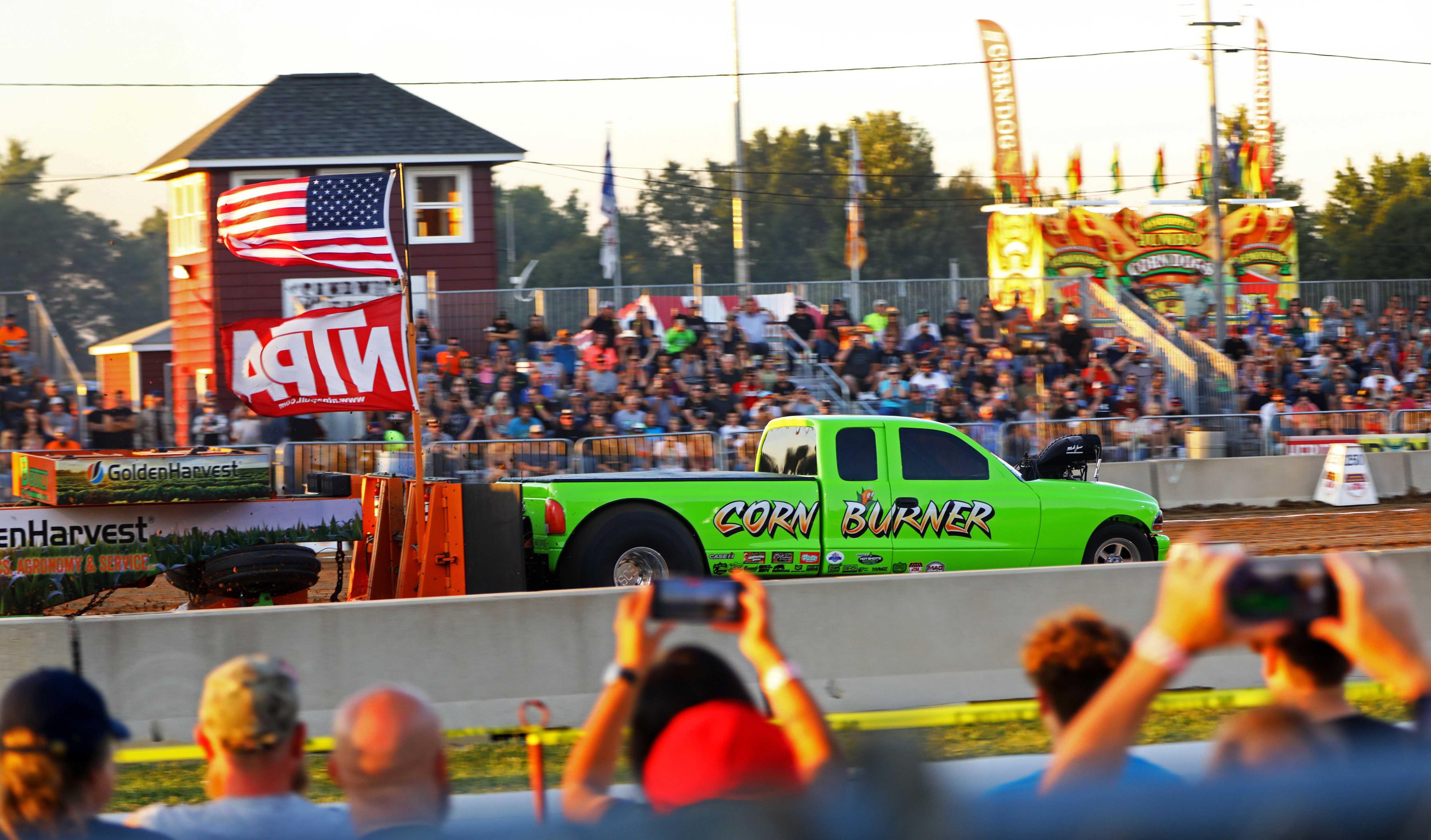 Spectators watch the NTPA (National Tractor Pullers Association Inc.) competition.