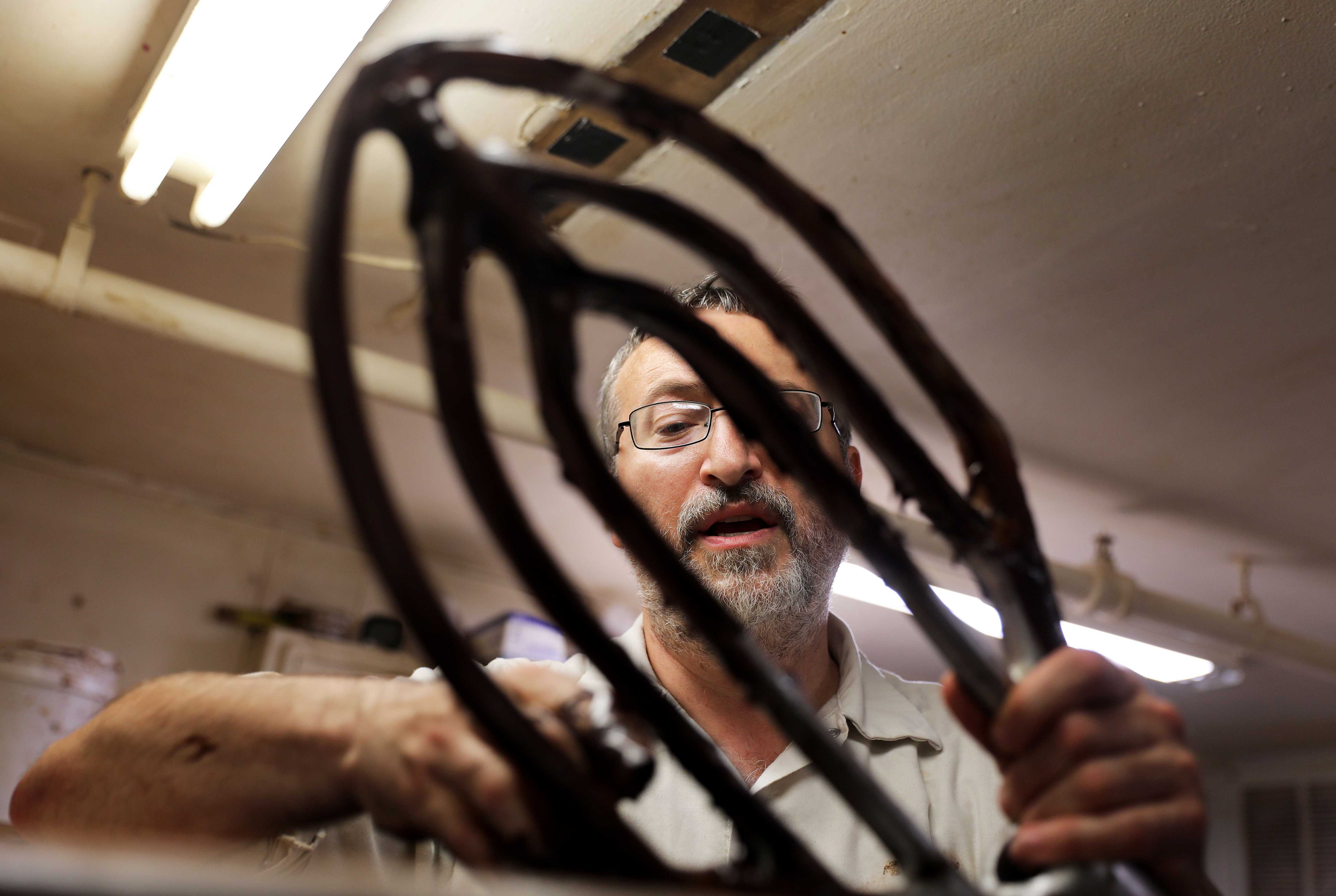 Israel Roling cleaned fudge from a paddle for an 80-quart bowl at his family’s strictly kosher business, Roling’s Bakery in Elkins Park, Pa.