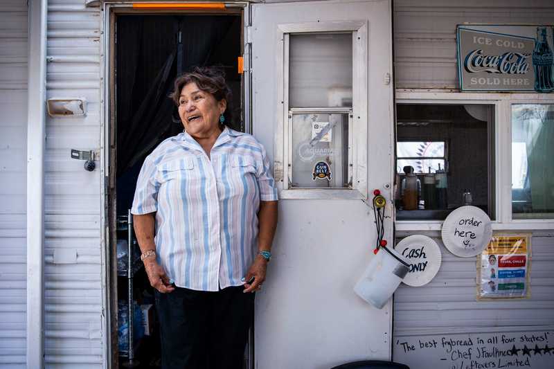 Daisy Kady stood outside of her business, Grandma's Frybread, where she prepares Navajo fry bread in her camper-turned-kitchen.