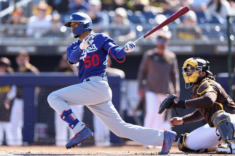 PEORIA, ARIZONA - FEBRUARY 27: Mookie Betts #50 of the Los Angeles Dodgers bats against the San Diego Padres during the first inning of the spring training game at Peoria Stadium on February 27, 2023 in Peoria, Arizona. (Photo by Christian Petersen/Getty Images)