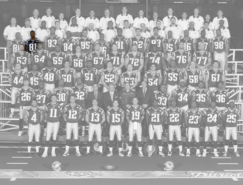 A team photo of the Super Bowl 36 champion New England Patriots, with the color removed, except for Charles Johnson