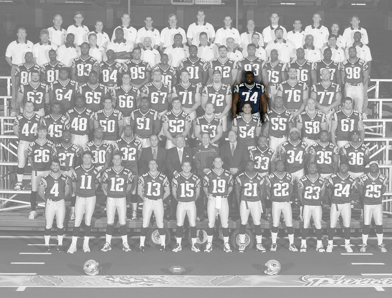 A team photo of the Super Bowl 36 champion New England Patriots, with the color removed, except for Kenyatta Jones