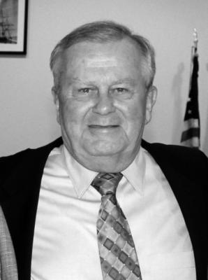 A black and white profile picture of Kevin Murphy