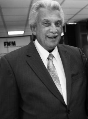 A black and white profile picture of Joseph Ligotti