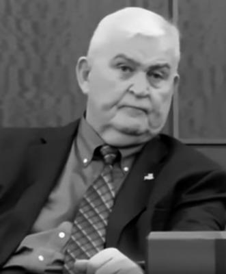 A black and white profile picture of William Lisano